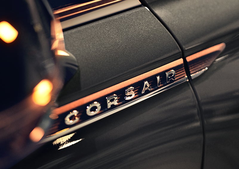 The stylish chrome badge reading “CORSAIR” is shown on the exterior of the vehicle. | Caruso Lincoln in Long Beach CA