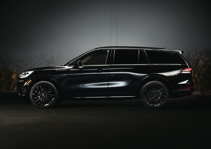 A 2024 Lincoln Aviator® SUV is shown in the Infinite Black exterior color | Caruso Lincoln in Long Beach CA