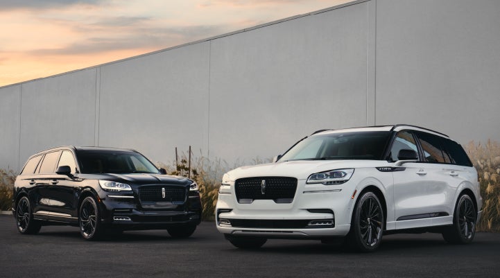 Two Lincoln Aviator® SUVs are shown with the available Jet Appearance Package | Caruso Lincoln in Long Beach CA