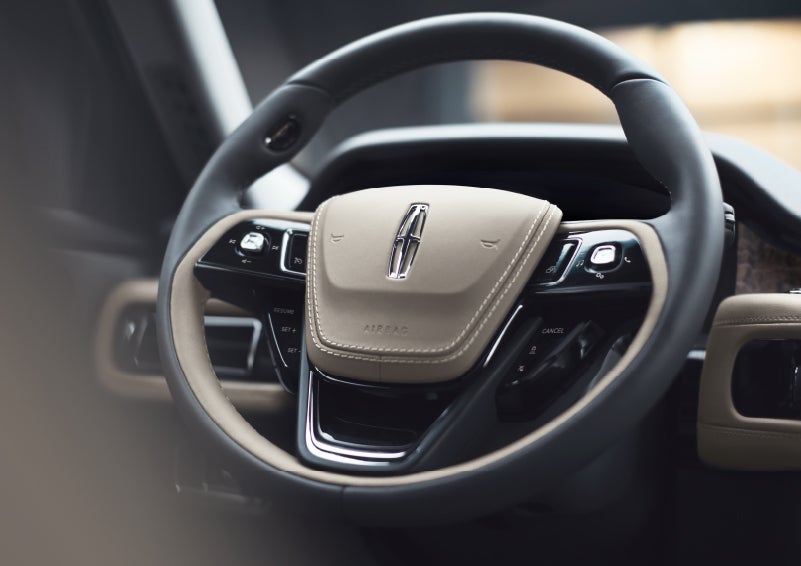 The intuitively placed controls of the steering wheel on a 2024 Lincoln Aviator® SUV | Caruso Lincoln in Long Beach CA