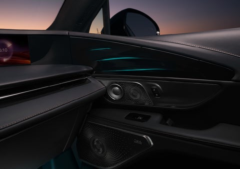 Selectable ambient lighting glows in the passenger door panel. | Caruso Lincoln in Long Beach CA