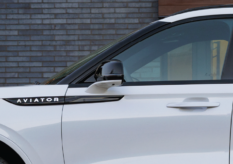 The driver’s door of a white 2025 Lincoln Aviator® SUV is showcased. | Caruso Lincoln in Long Beach CA