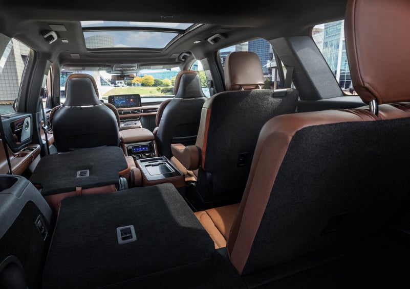 The interior of the 2025 Lincoln Aviator® SUV is shown with two seats folded down for added space. | Caruso Lincoln in Long Beach CA