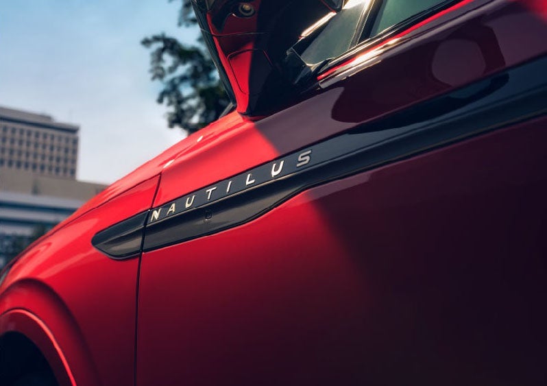 A side badge on the passenger door reads Nautilus. | Caruso Lincoln in Long Beach CA