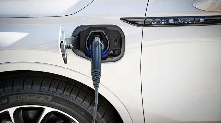 An electric charger is shown plugged into the charging port of a Lincoln Corsair® Grand Touring
model. | Caruso Lincoln in Long Beach CA