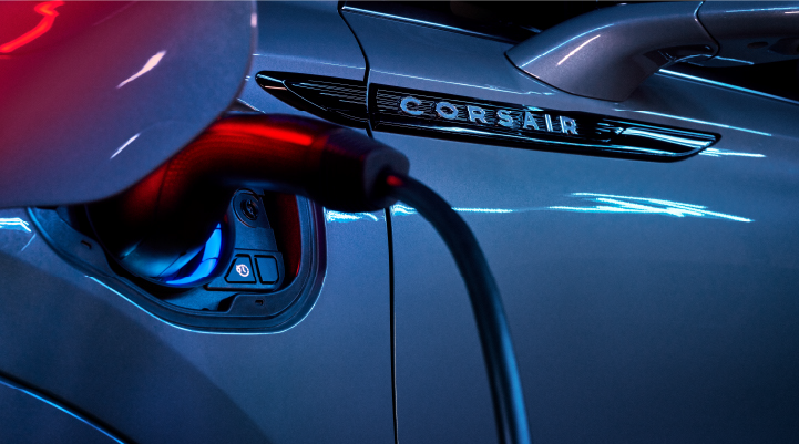 A charger plugged into the charging port of a 2025 Lincoln Corsair® Plug-in Hybrid model. | Caruso Lincoln in Long Beach CA