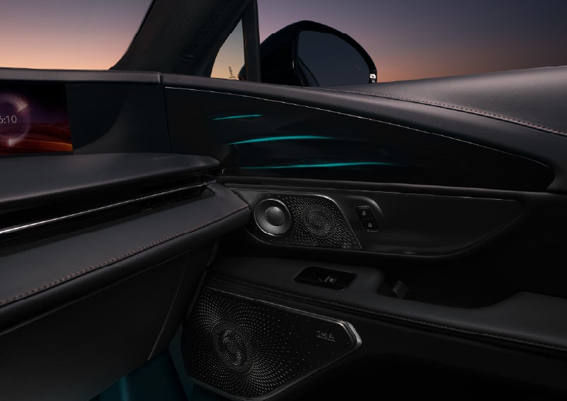 Selectable ambient lighting glows in the passenger door panel. | Caruso Lincoln in Long Beach CA